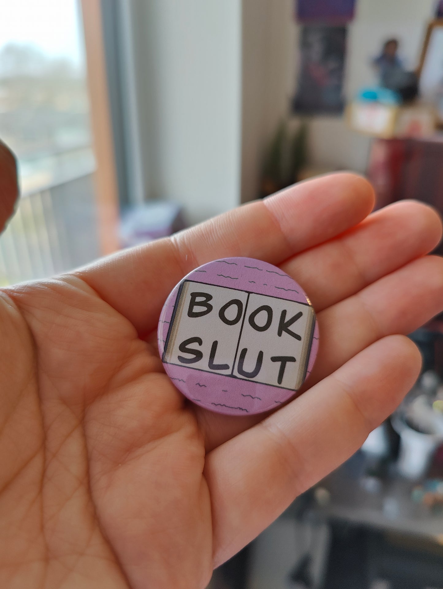 Button: Book slut