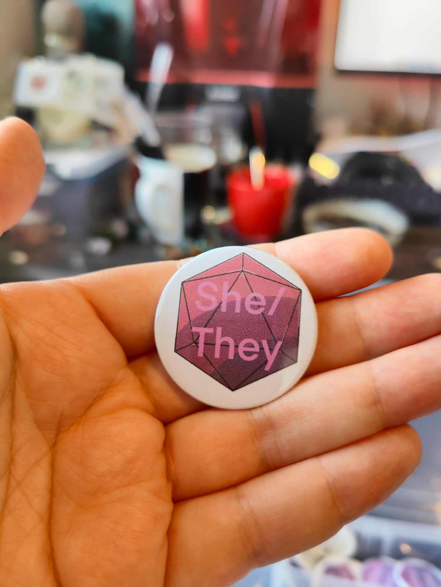 Button: She/They pronoun