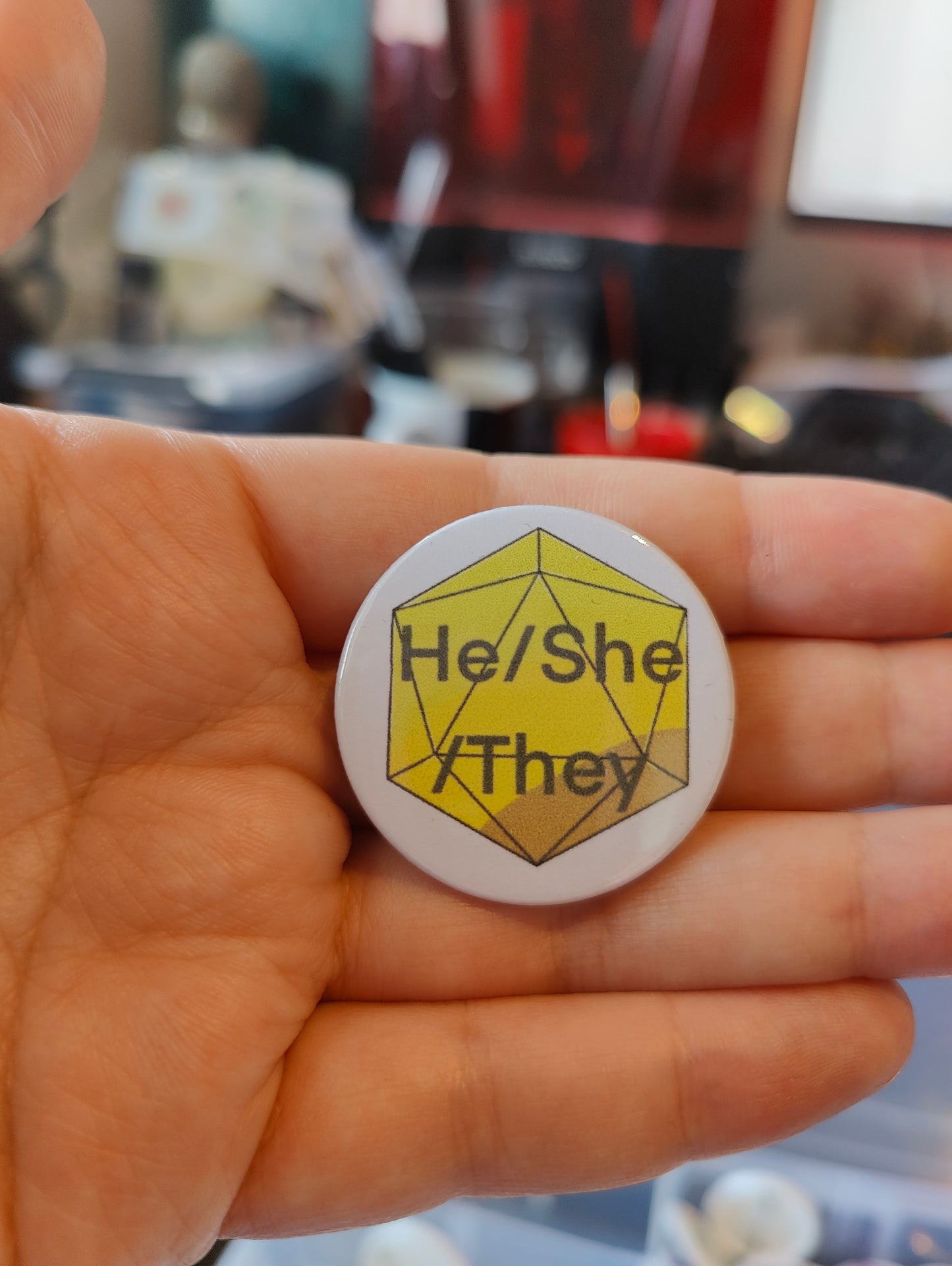 Button: He/She/They pronoun