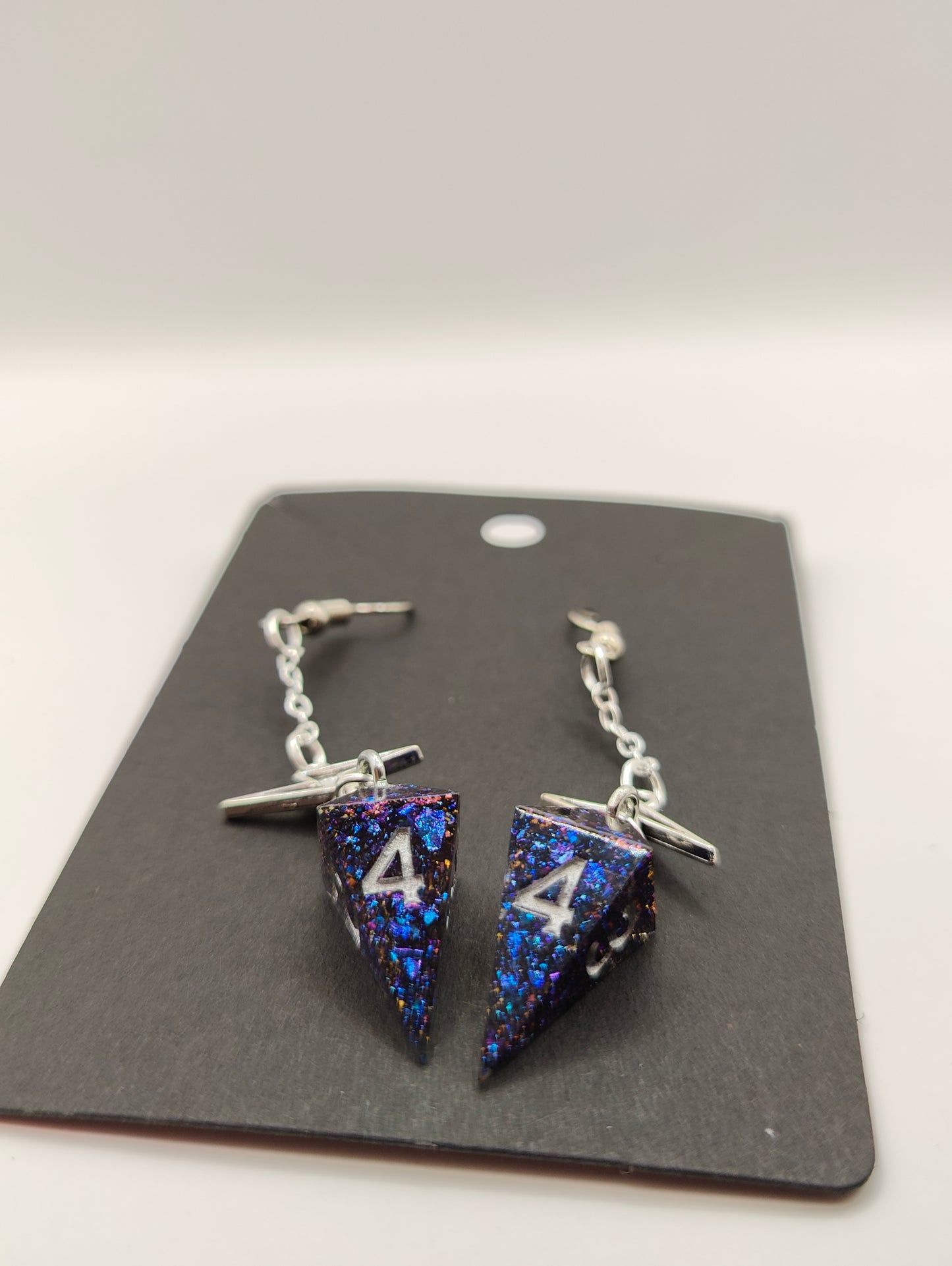 Handmade dangly mini D4 earrings: Shifting galaxies