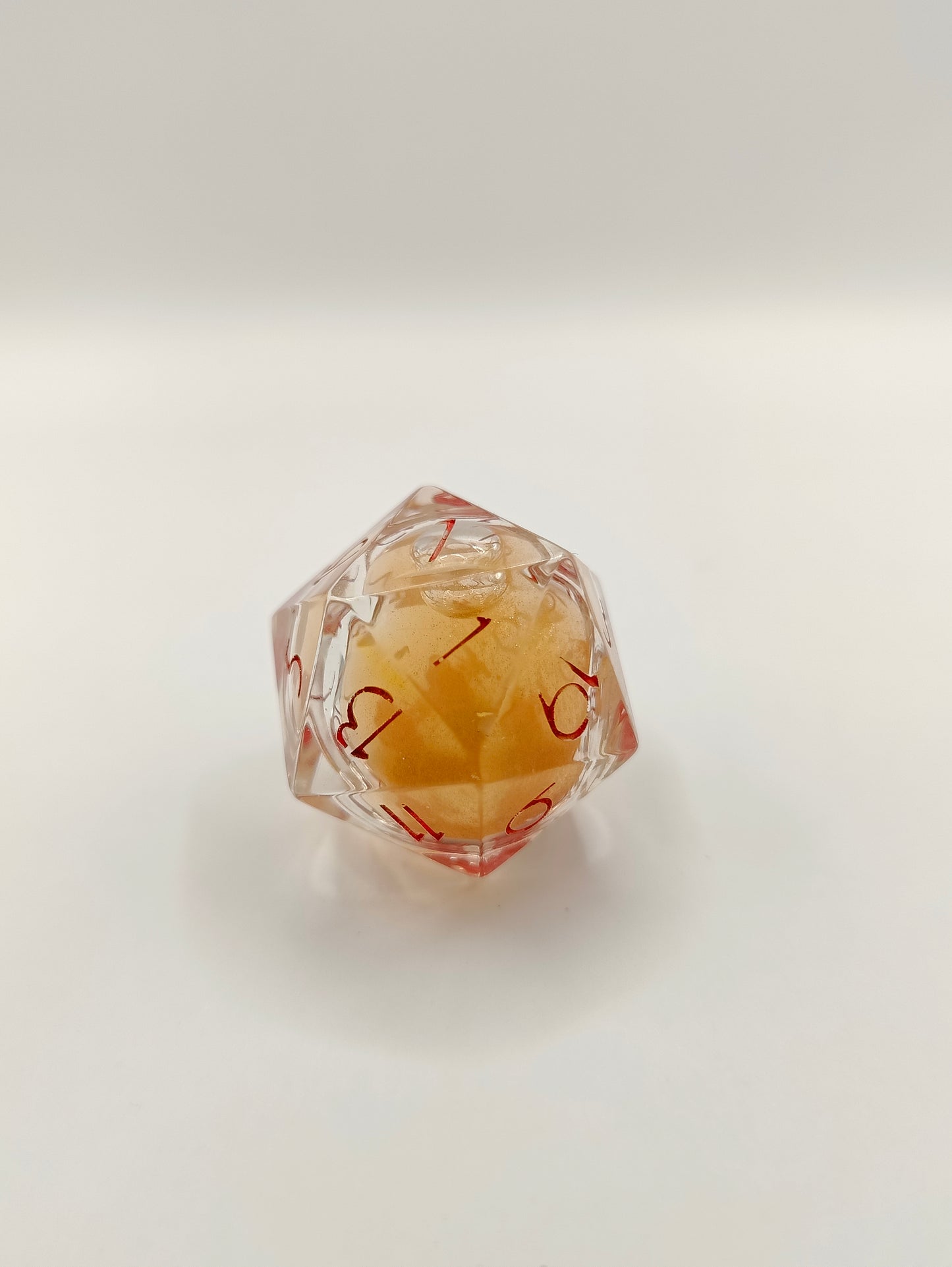 Handmade liquid core D20: Emberstorm