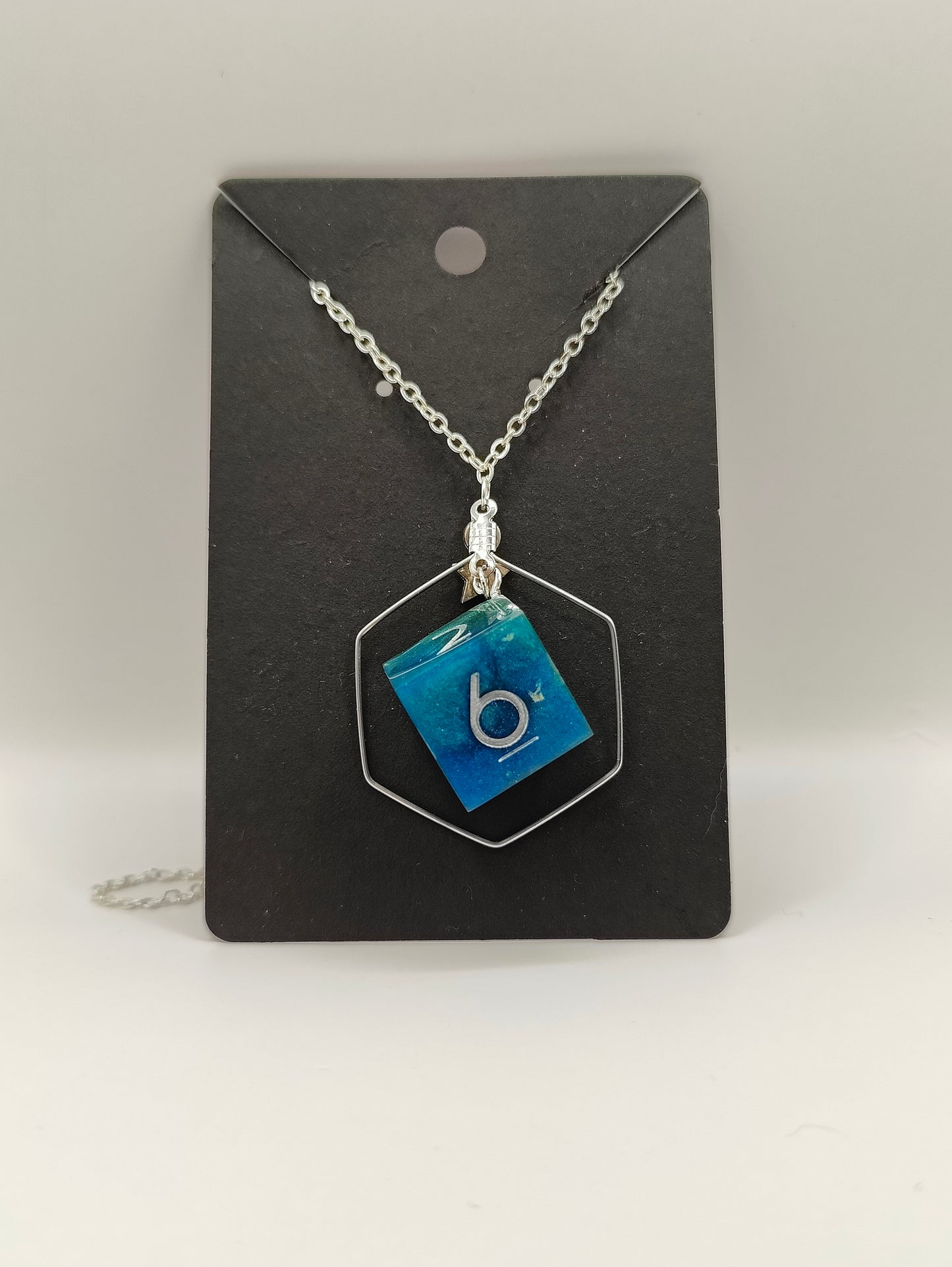 Handmade dice necklace: Poseidon's D6